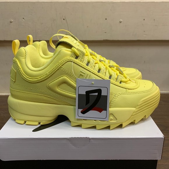 all yellow fila shoes